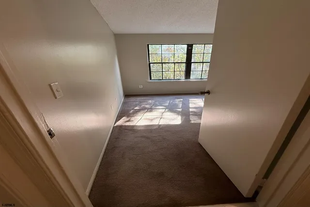 view of an empty room and window