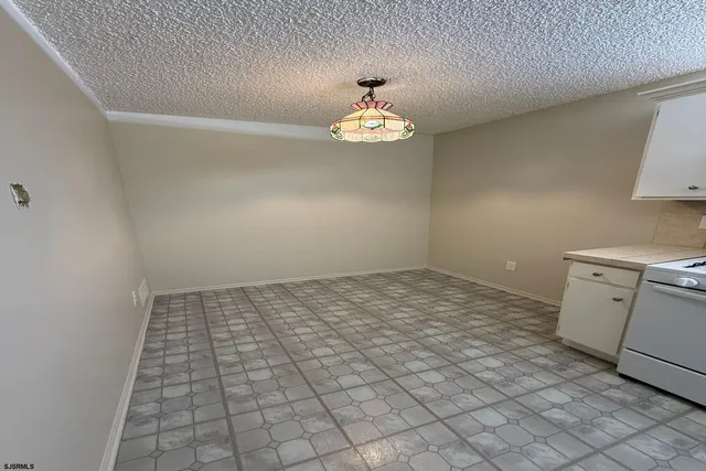 a view of a kitchen with a sink