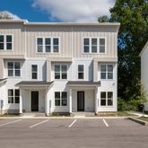 a front view of a building with street view