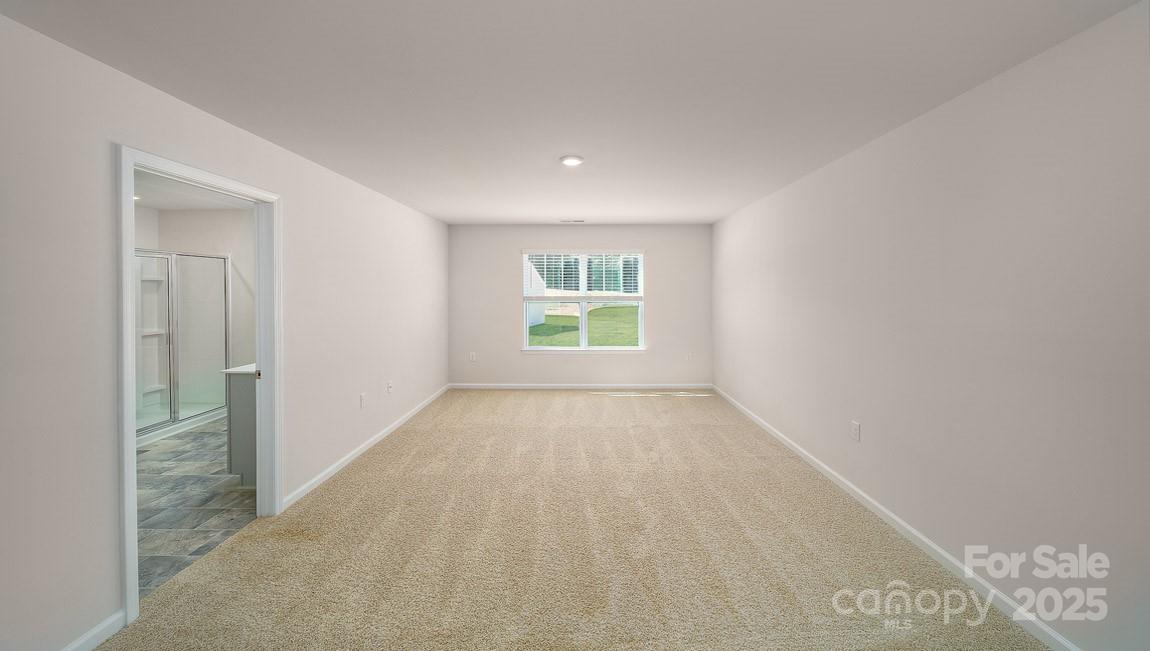 180 Salers Road Fletcher, NC 28732 - Photo 16 of 29 a view of an empty room with a window