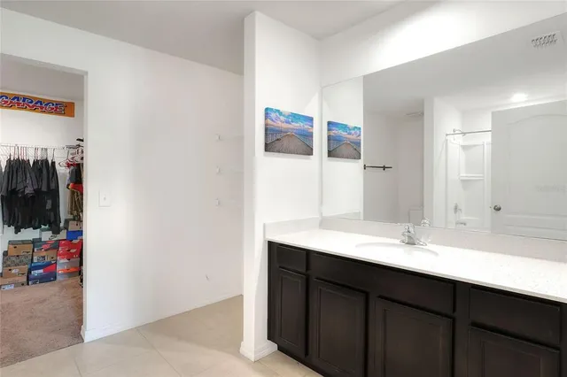 a bathroom with a shower and a toilet