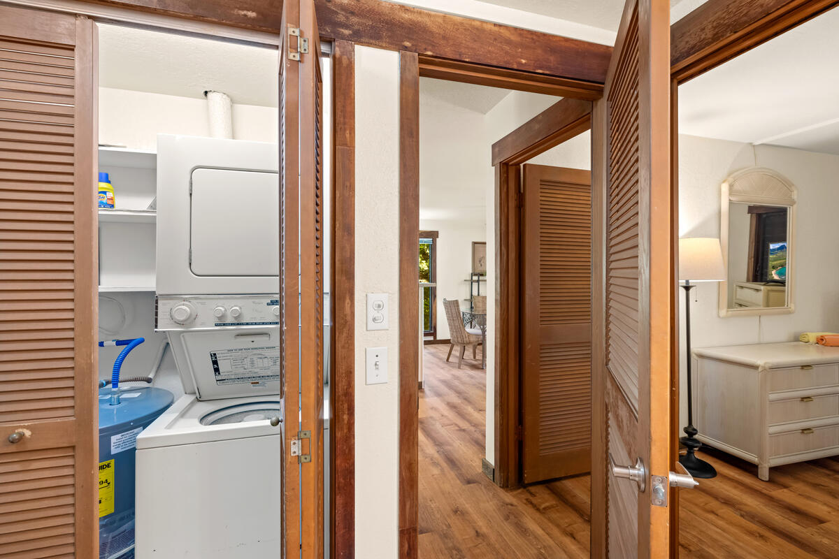 2721 Poipu Road, Unit 100 Koloa, HI 96756 - Photo 11 of 26 a bathroom with a tub sink and mirror