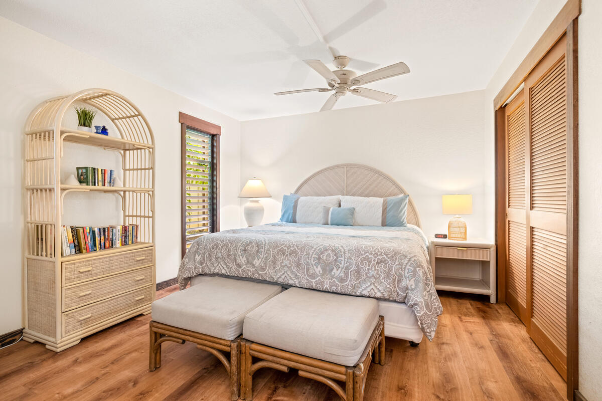 2721 Poipu Road, Unit 100 Koloa, HI 96756 - Photo 12 of 26 a bedroom with furniture and a window