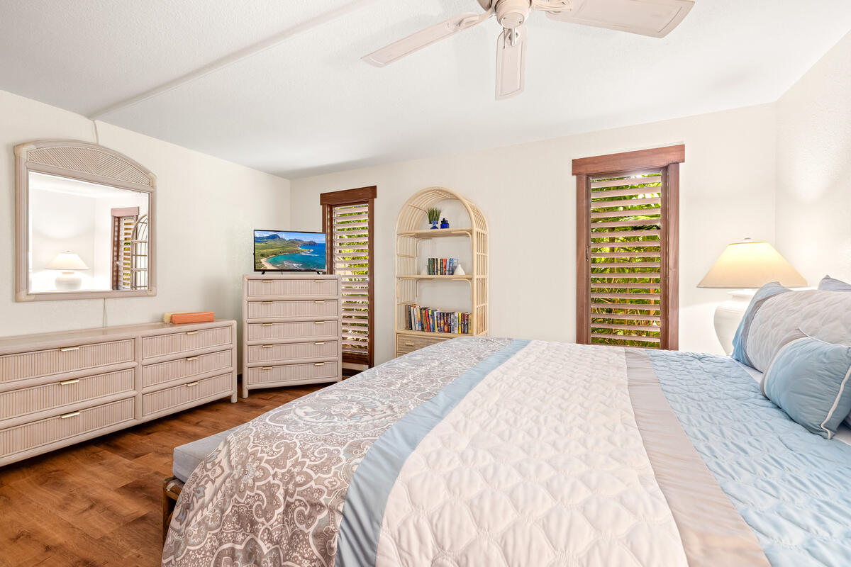 2721 Poipu Road, Unit 100 Koloa, HI 96756 - Photo 13 of 26 a bedroom with a bed and a closet