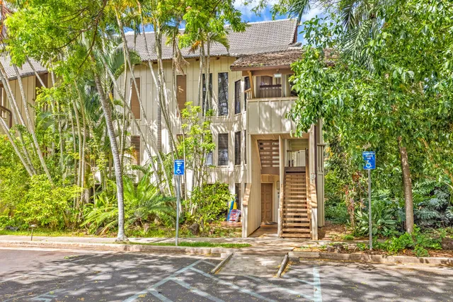 a view of swimming pool and trees