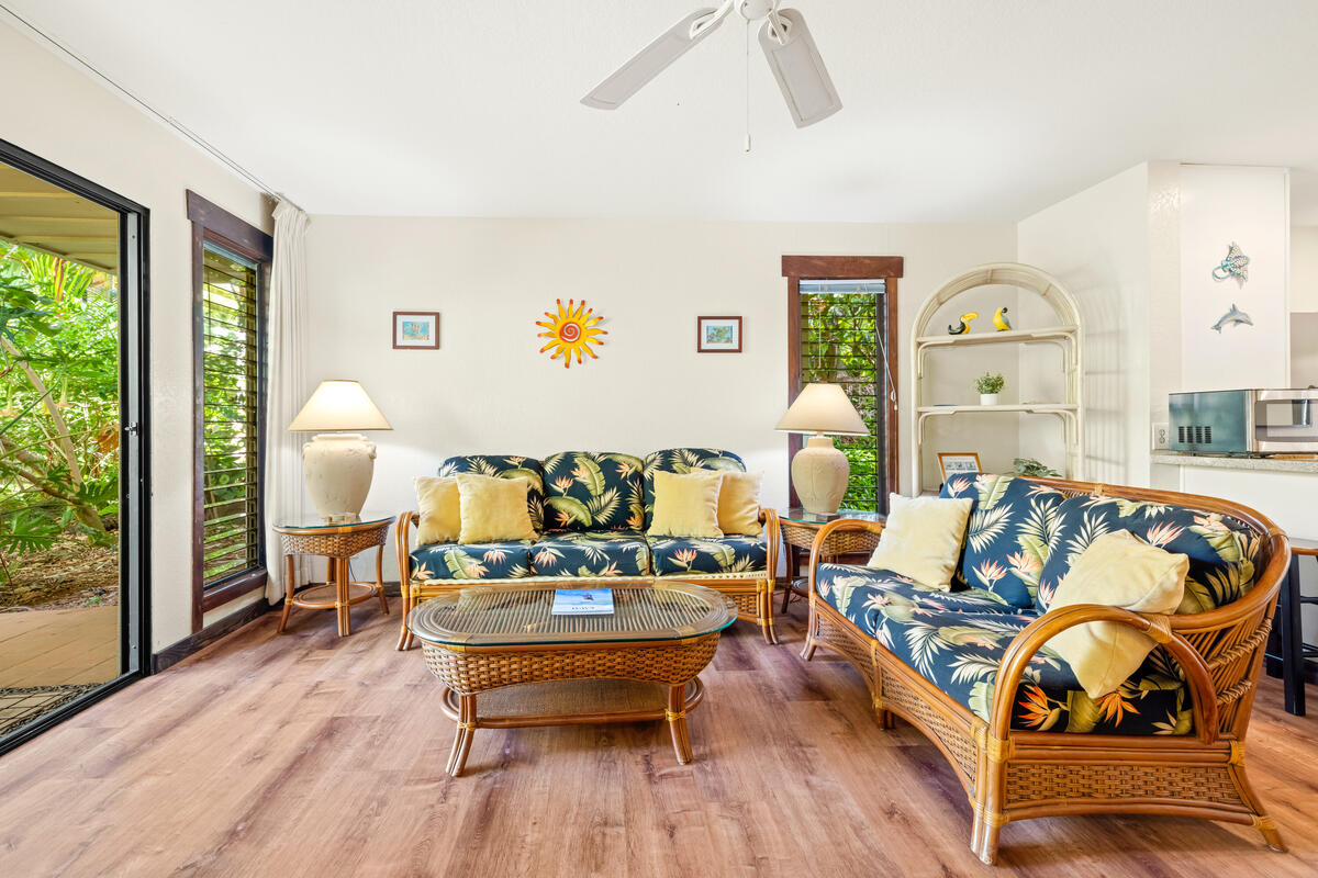 2721 Poipu Road, Unit 100 Koloa, HI 96756 - Photo 6 of 26 a living room with furniture and wooden floor