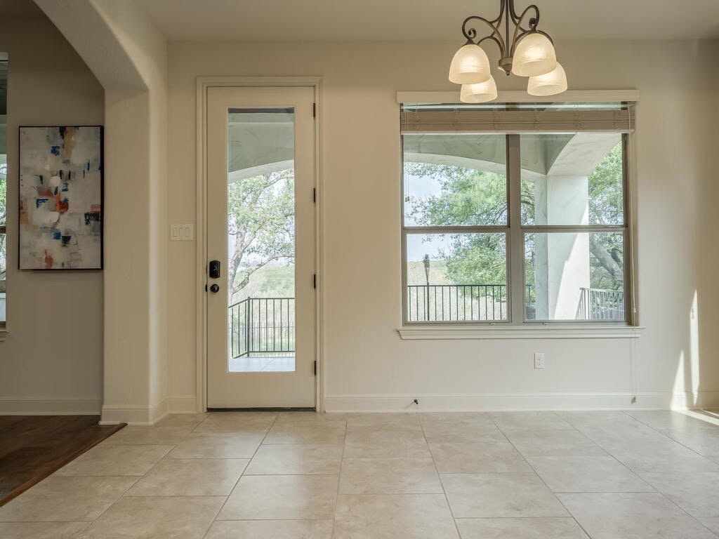 12912 Schleicher Trail Austin, TX 78732 - Photo 11 of 39 a view of an empty room with a window