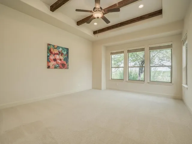 a kitchen with stainless steel appliances granite countertop a sink and a stove