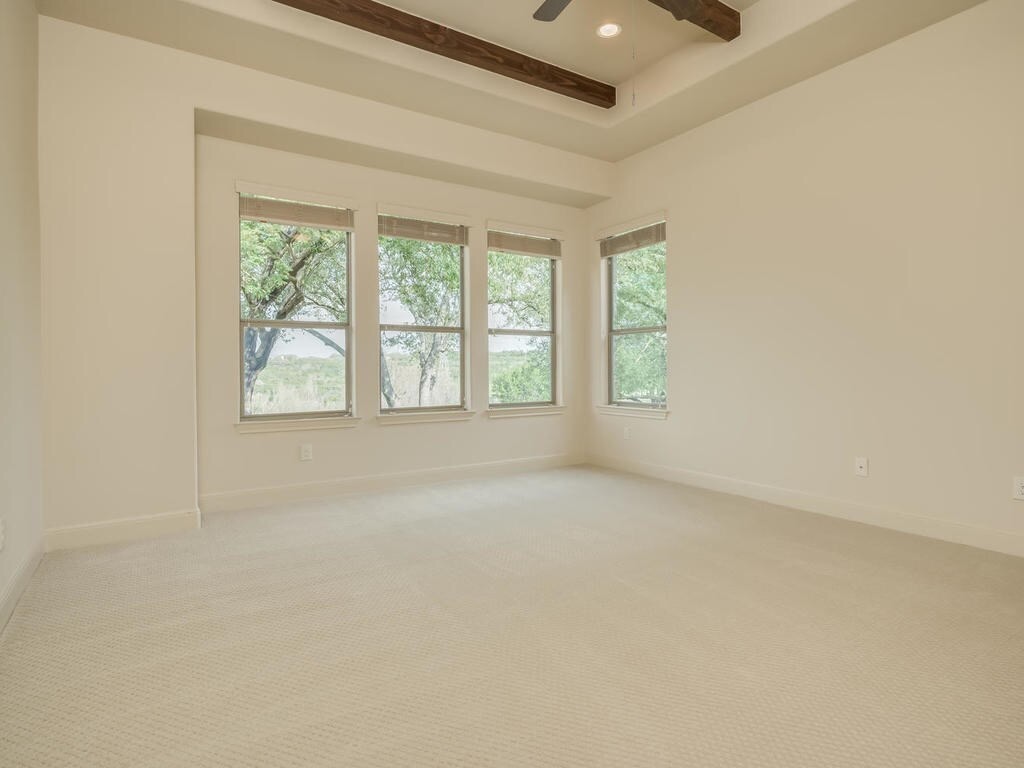 12912 Schleicher Trail Austin, TX 78732 - Photo 21 of 39 an empty room with windows