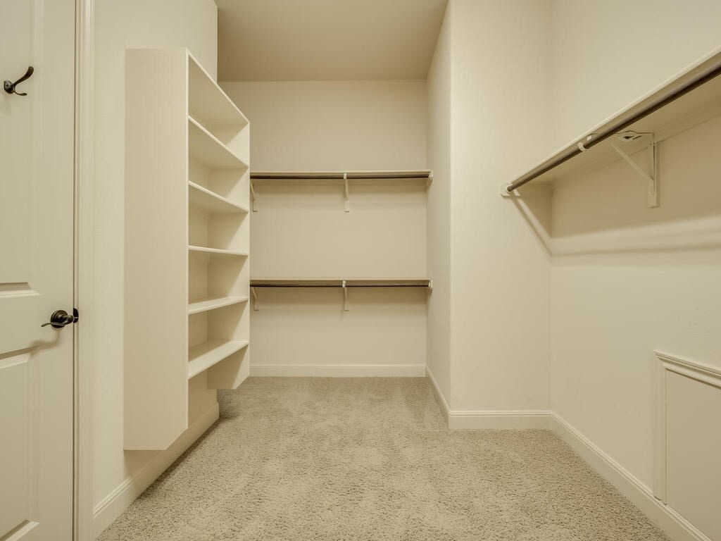 12912 Schleicher Trail Austin, TX 78732 - Photo 23 of 39 a view of an empty walk in closet