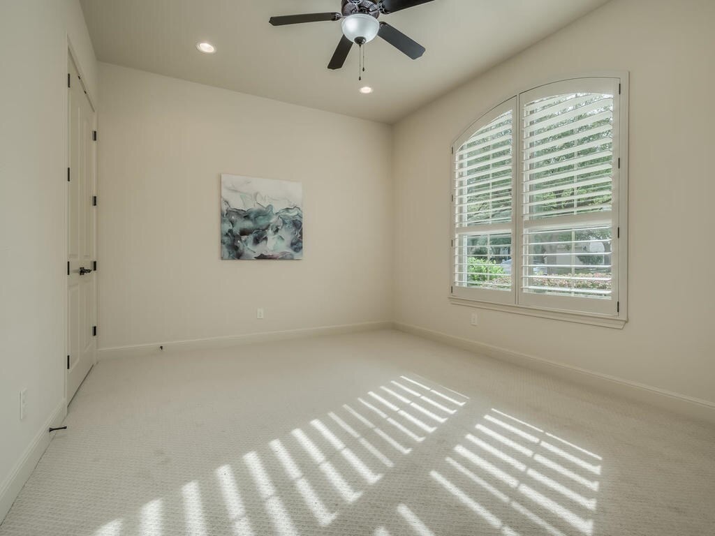12912 Schleicher Trail Austin, TX 78732 - Photo 5 of 39 a view of an empty room with a window