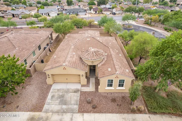 an aerial view of a house with garden