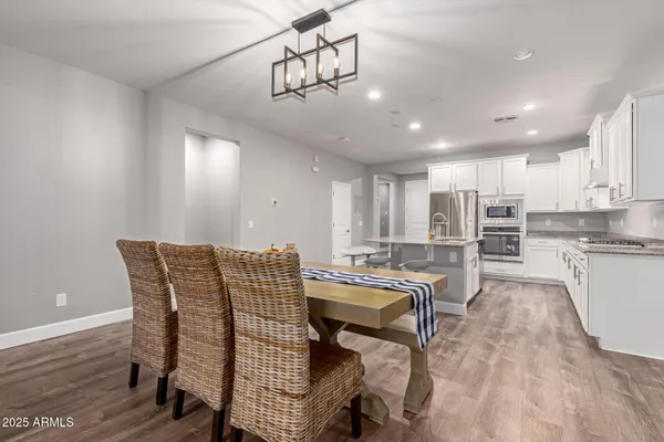 a view of a dining room with furniture