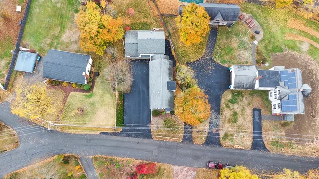 an aerial view of residential house with outdoor space