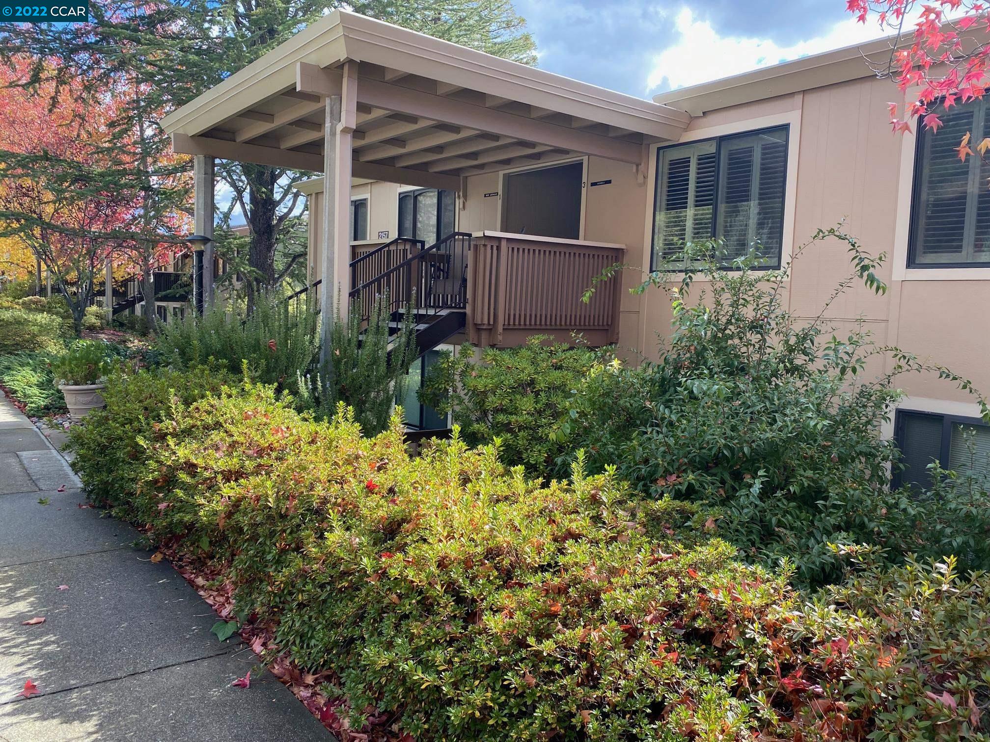 2157 Golden Rain Road, Unit 1 Walnut Creek, CA 94595 - Photo 1 of 1 a view of a house with a flower garden