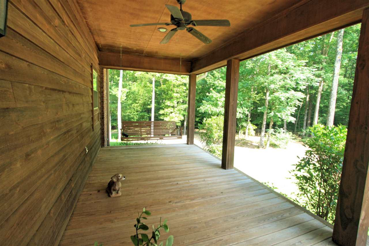 6810 Oakley Palestine Road Raymond, MS 39154 - Photo 3 of 43 Right end of porch with swing
