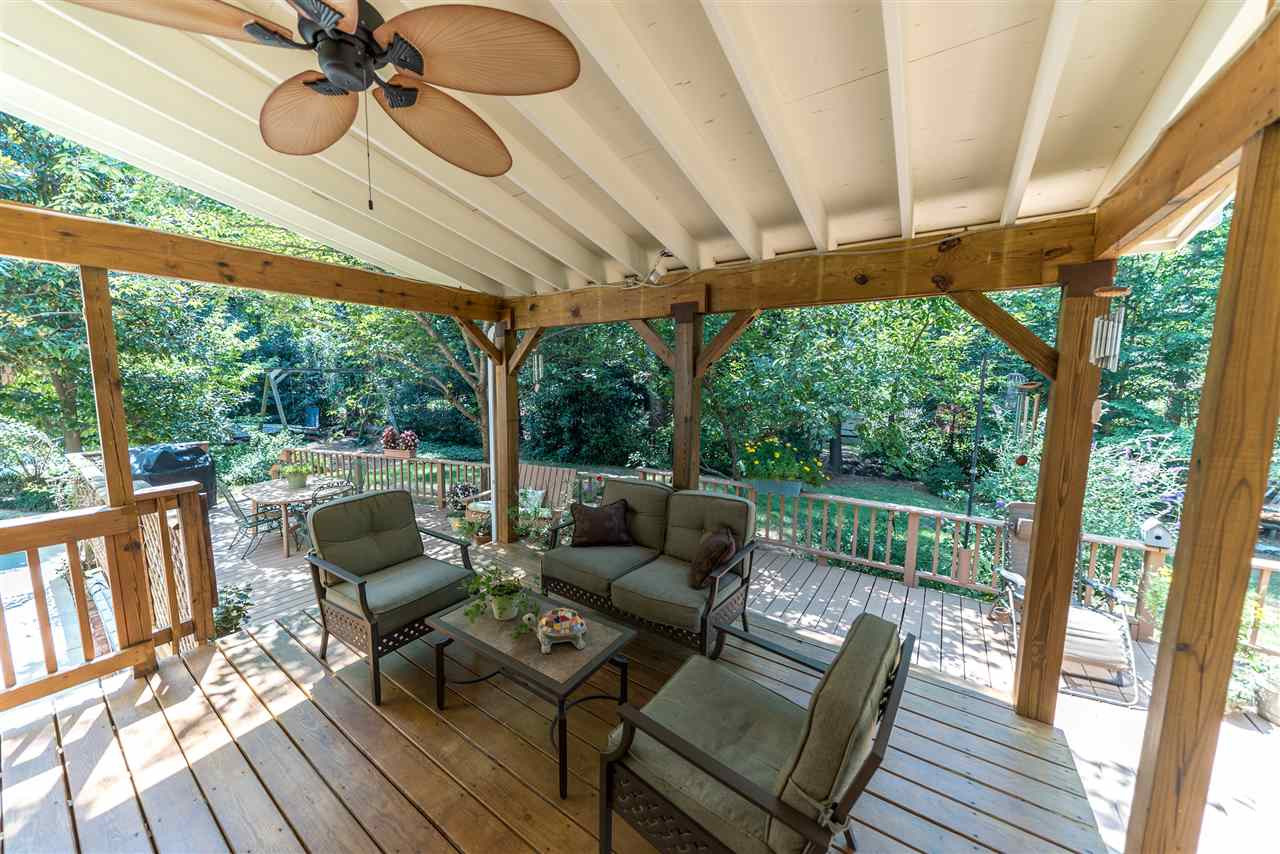 9301 Foxburrow Court Raleigh, NC 27613 - Photo 22 of 25 Straight out of Better Homes and Gardens - this back porch will be where everyone wants to congregate! This addition was built to be finished square footage, so could always be enclosed to make a four season room or even just a screened porch! Back Porch