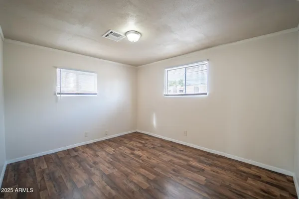 an empty room with windows