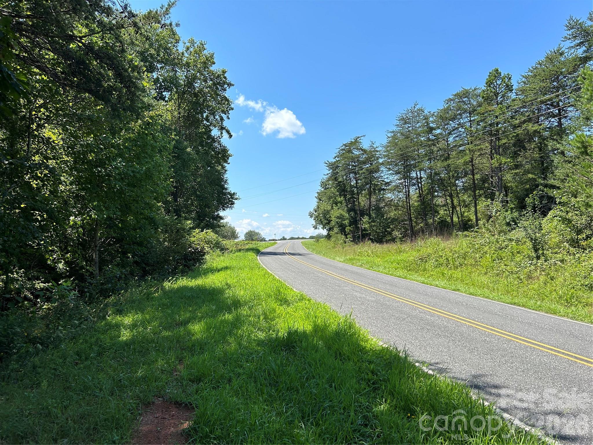 0 Gilbert Road Vale, NC 28168 - Photo 3 of 8 a view of a yard with a large trees
