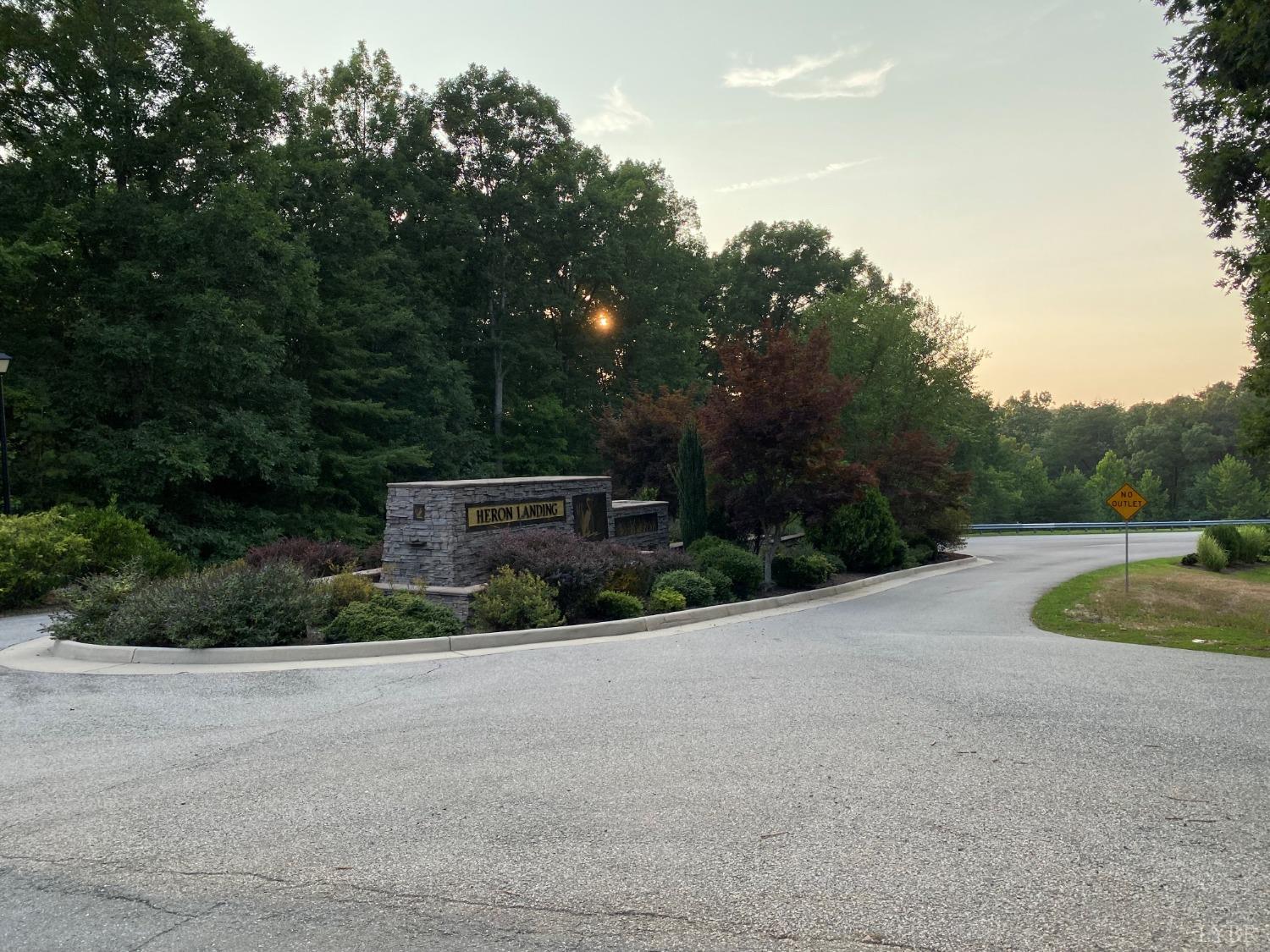 135 Marina View Drive Gretna, VA 24557 - Photo 3 of 9 a front view of a house with garden