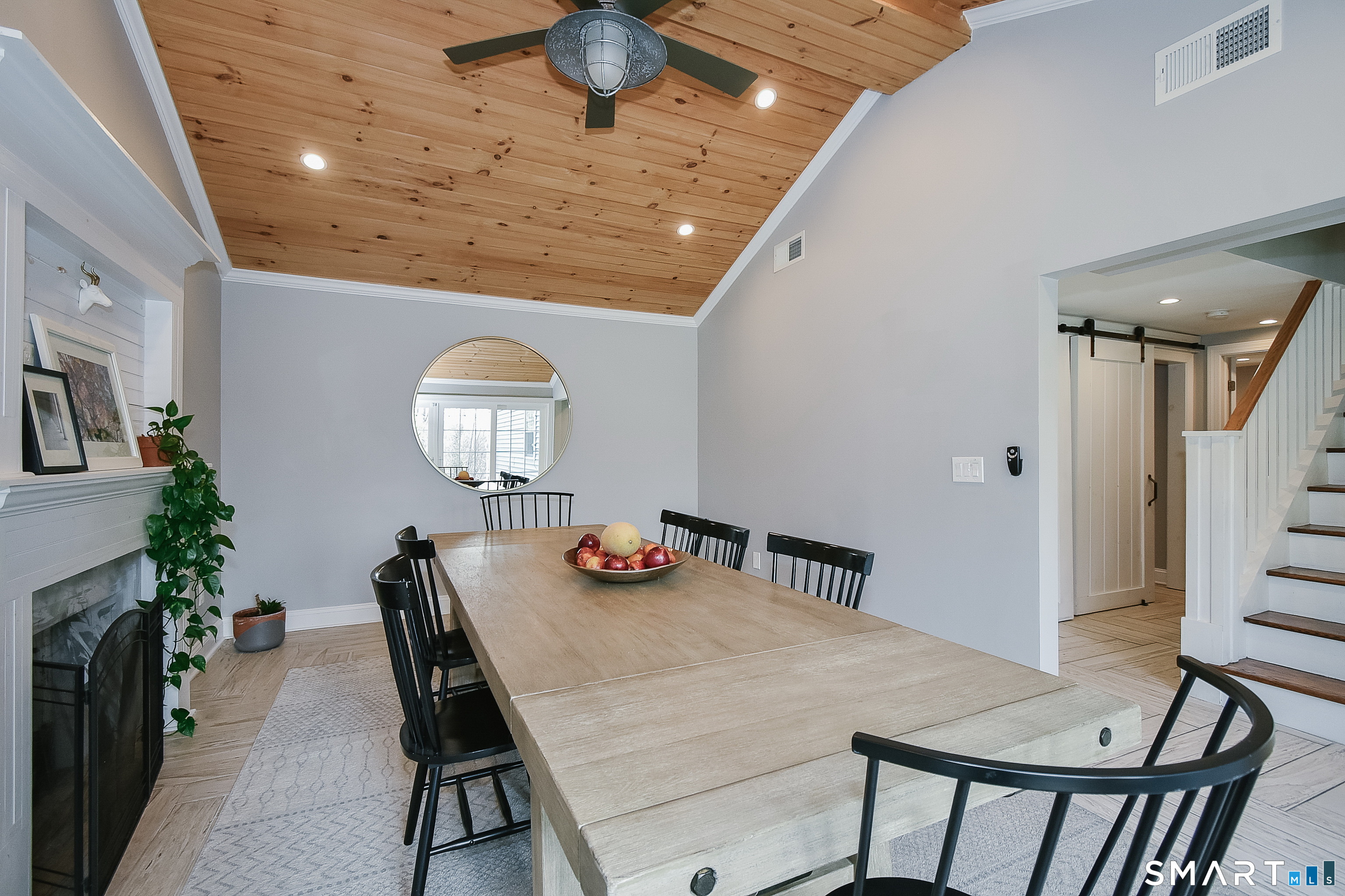 50 1/2 Mountain Spring Road Farmington, CT 06032 - Photo 10 of 28 a view of a dining room with furniture and wooden floor