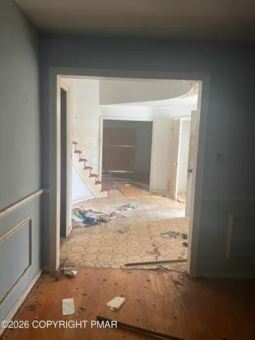 a view of an empty room and window