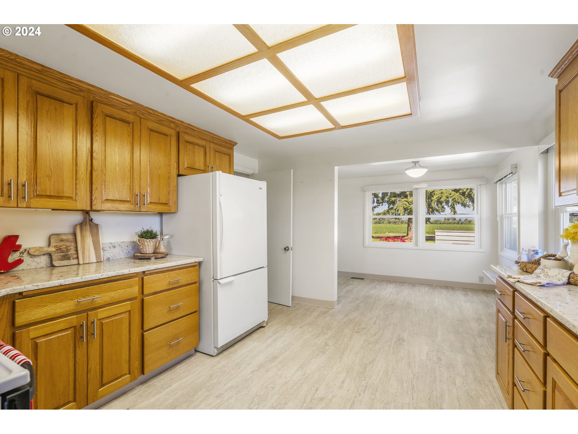 7075 Northwest Roy Road Cornelius, OR 97113 - Photo 11 of 48 a kitchen with cabinets and window