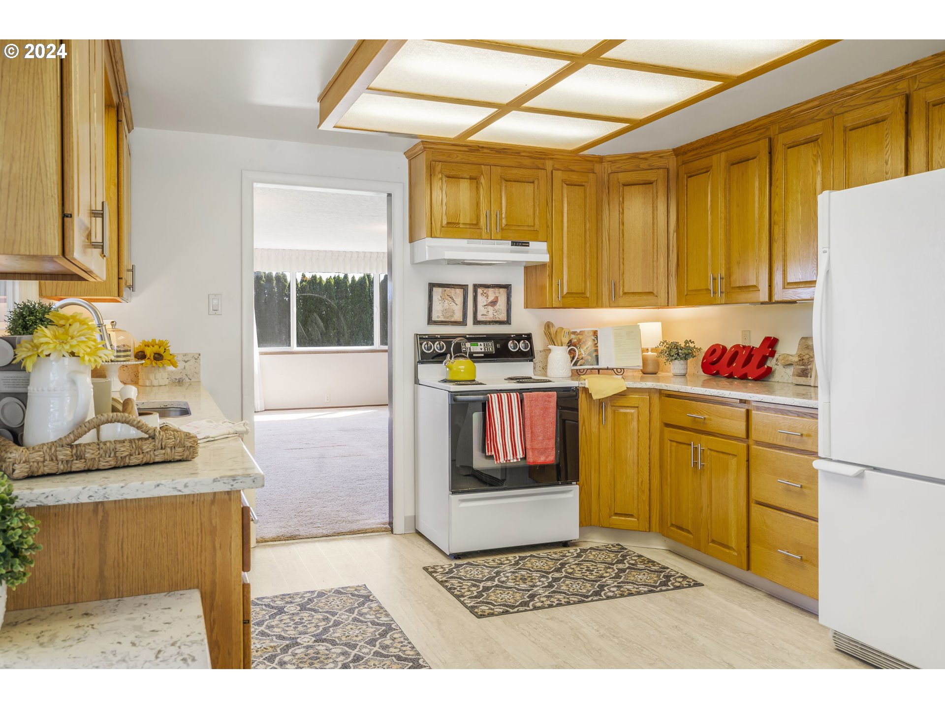 7075 Northwest Roy Road Cornelius, OR 97113 - Photo 12 of 48 a kitchen with a refrigerator and a stove top oven