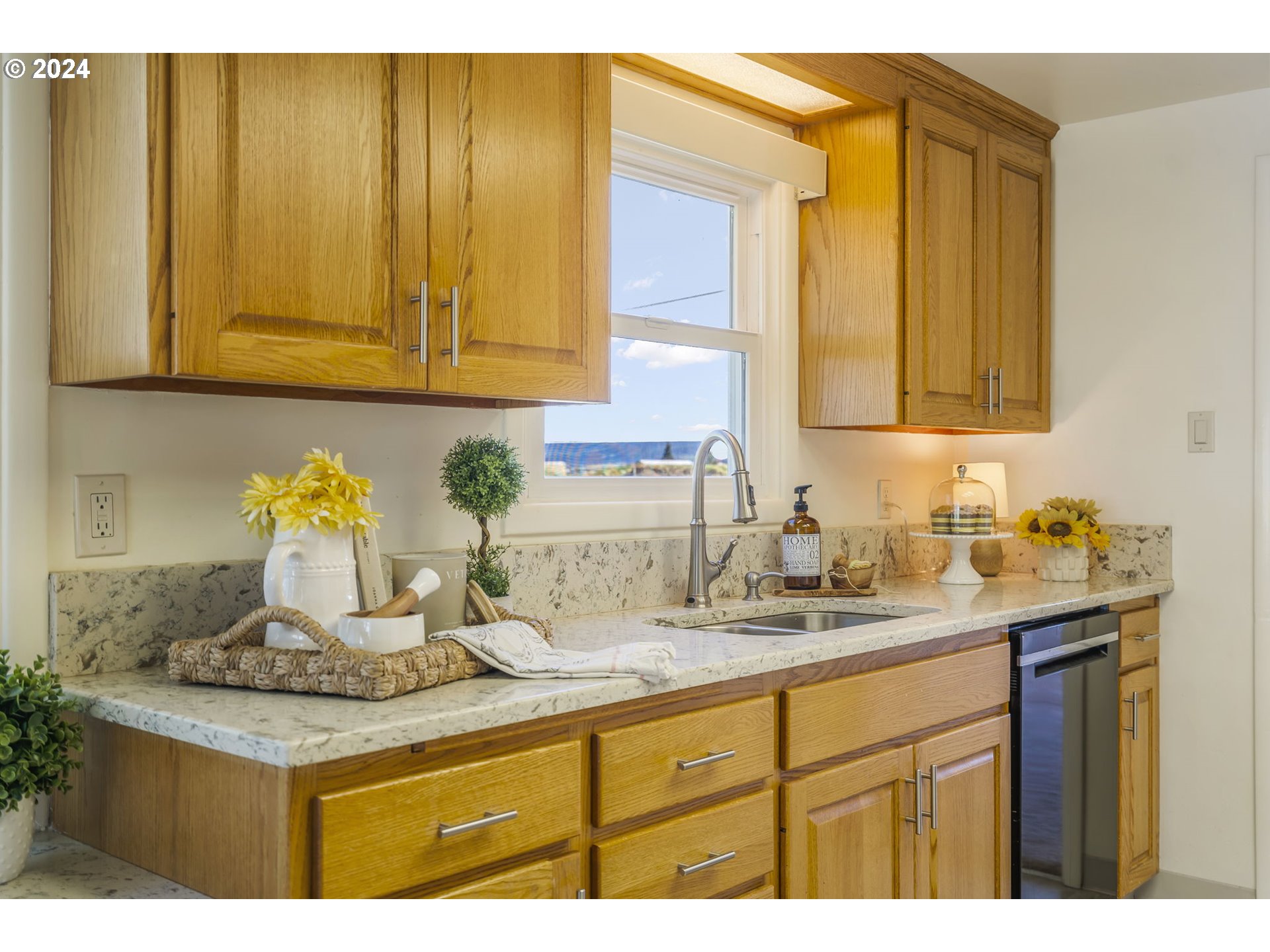 7075 Northwest Roy Road Cornelius, OR 97113 - Photo 13 of 48 a kitchen with sink cabinets and wooden floor
