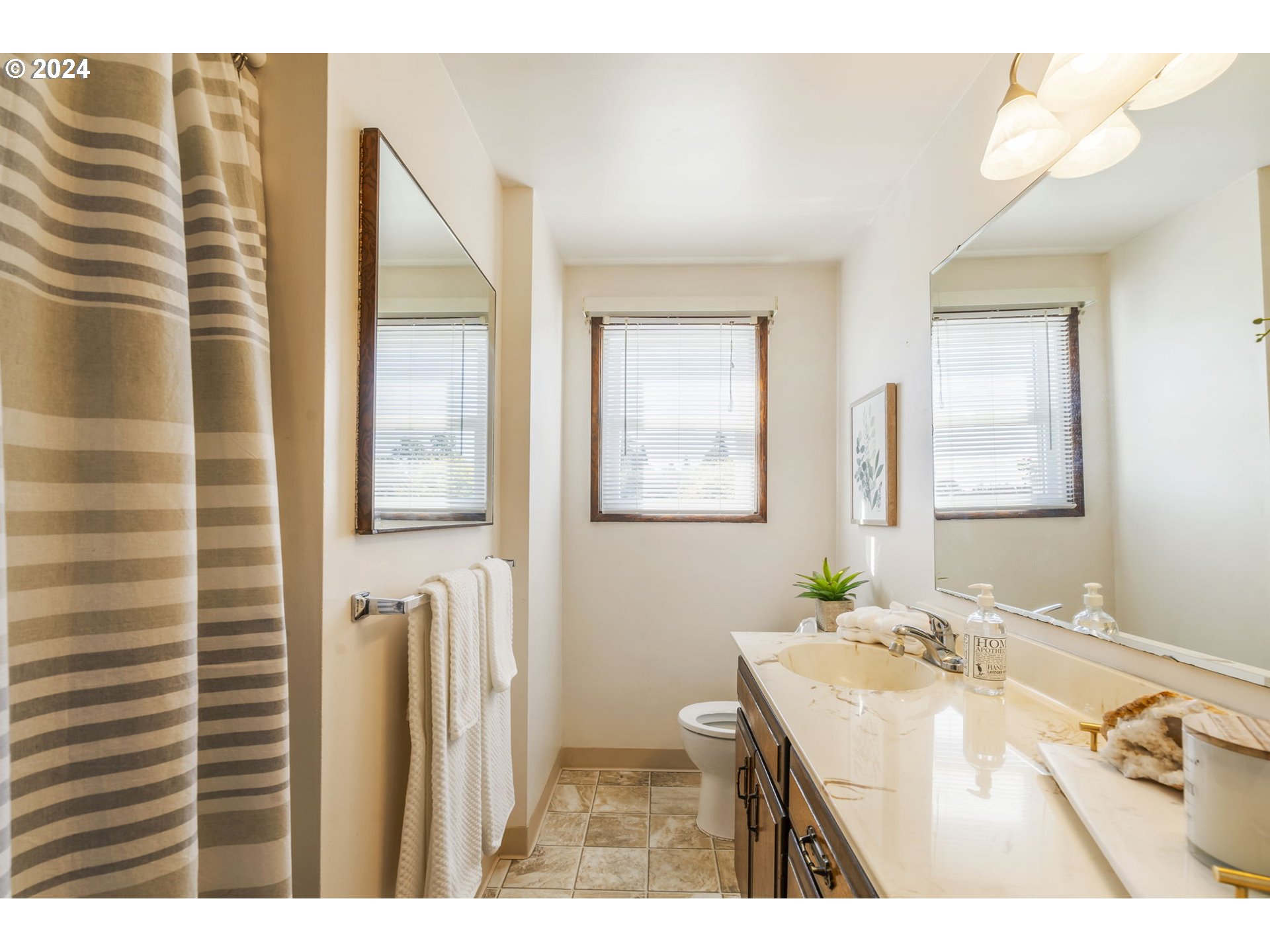 7075 Northwest Roy Road Cornelius, OR 97113 - Photo 20 of 48 a bathroom with a sink vanity and a mirror