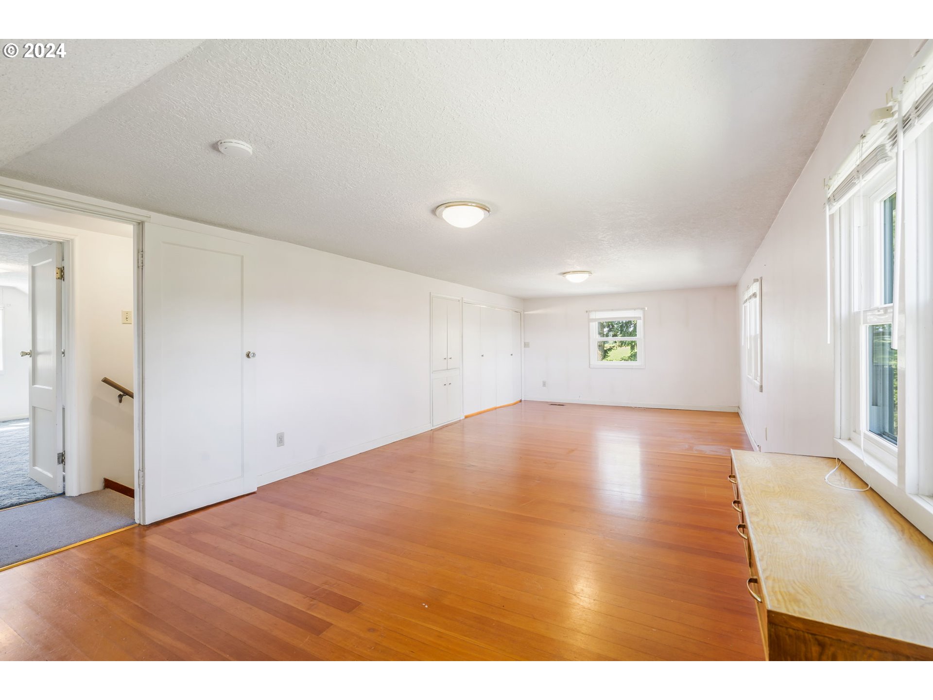7075 Northwest Roy Road Cornelius, OR 97113 - Photo 27 of 48 a view of empty room with wooden floor