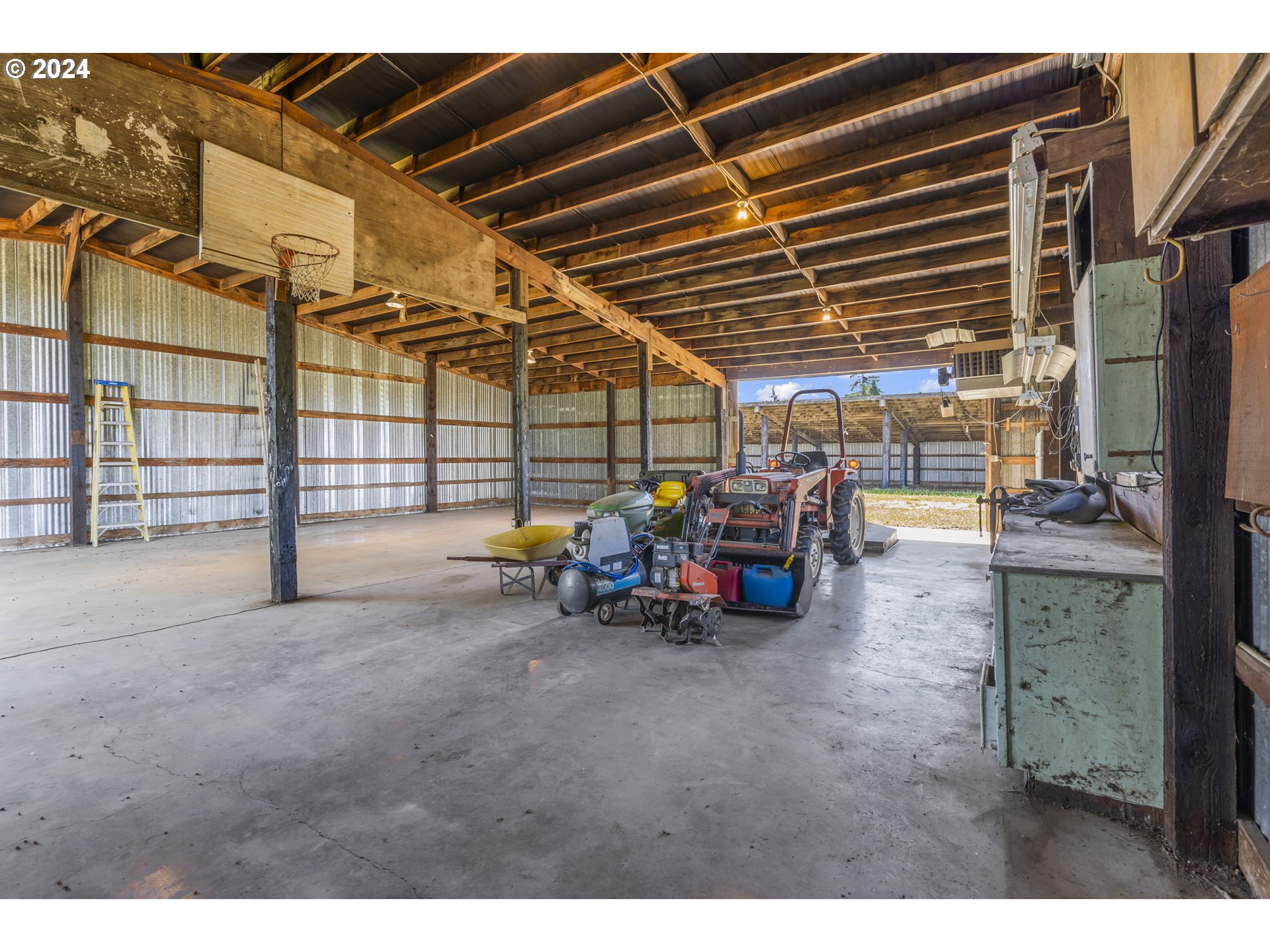 7075 Northwest Roy Road Cornelius, OR 97113 - Photo 41 of 48 a view of a garage with parked cars