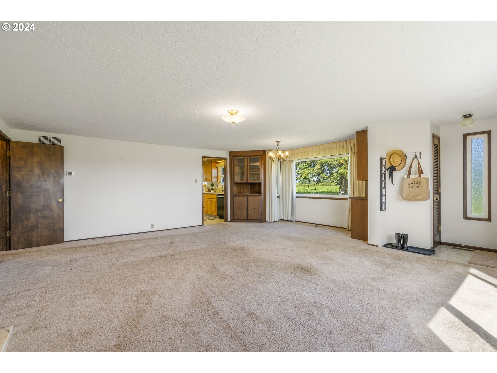 7075 Northwest Roy Road Cornelius, OR 97113 - Photo 5 of 48 a view of an empty room with a window