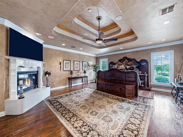 a view of a living room and chandelier fan or kitchen
