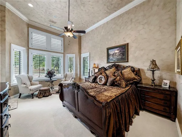 a bed room with a bed and a window