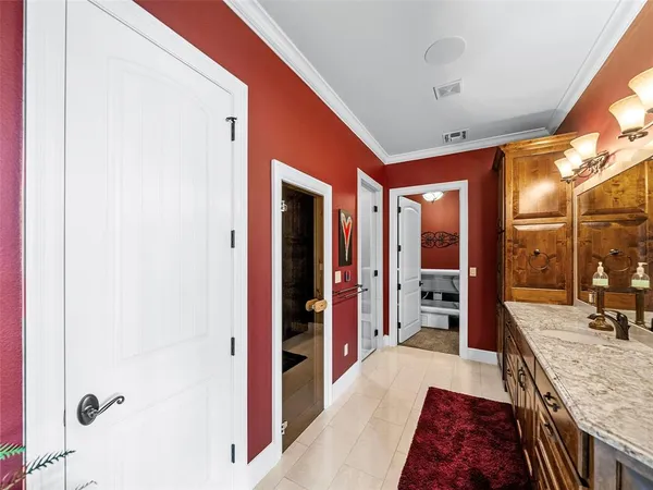 a bathroom with a sink and a shower curtain