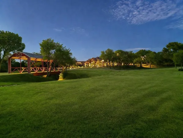 a view of a swimming pool with an outdoor seating and mountain view