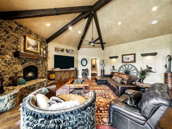 a kitchen with stainless steel appliances granite countertop a stove and a refrigerator