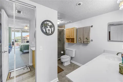 a kitchen with a table chairs stove and cabinets