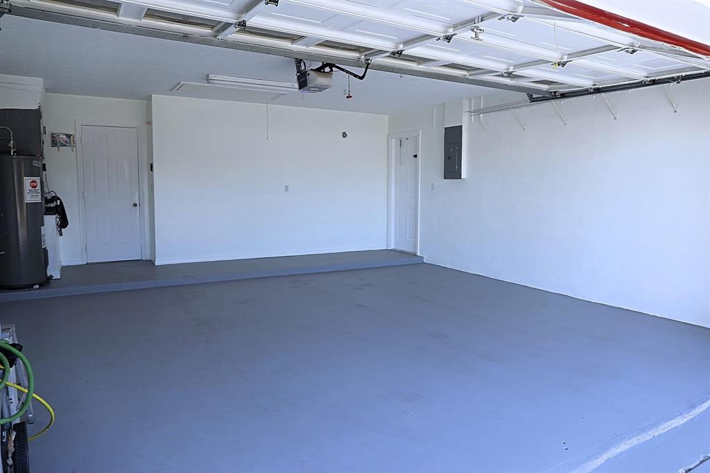 242 Southwest Parish Terrace Port St. Lucie, FL 34984 - Photo 3 of 14 a view of a room with an empty space