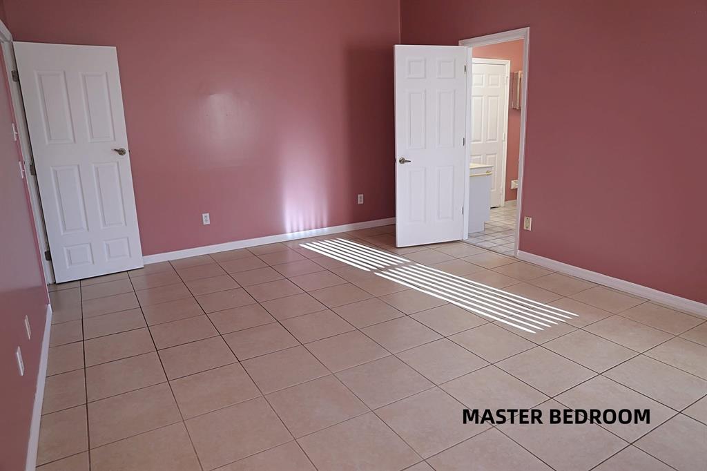 242 Southwest Parish Terrace Port St. Lucie, FL 34984 - Photo 5 of 14 a view of an empty room