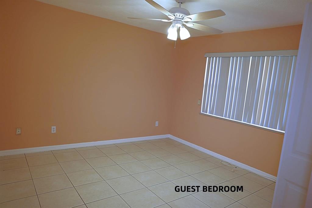 242 Southwest Parish Terrace Port St. Lucie, FL 34984 - Photo 8 of 14 an empty room with a window