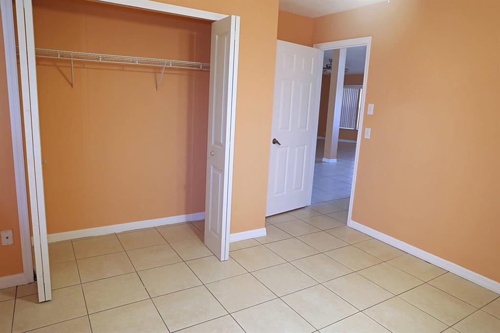 242 Southwest Parish Terrace Port St. Lucie, FL 34984 - Photo 9 of 14 a view of an empty room