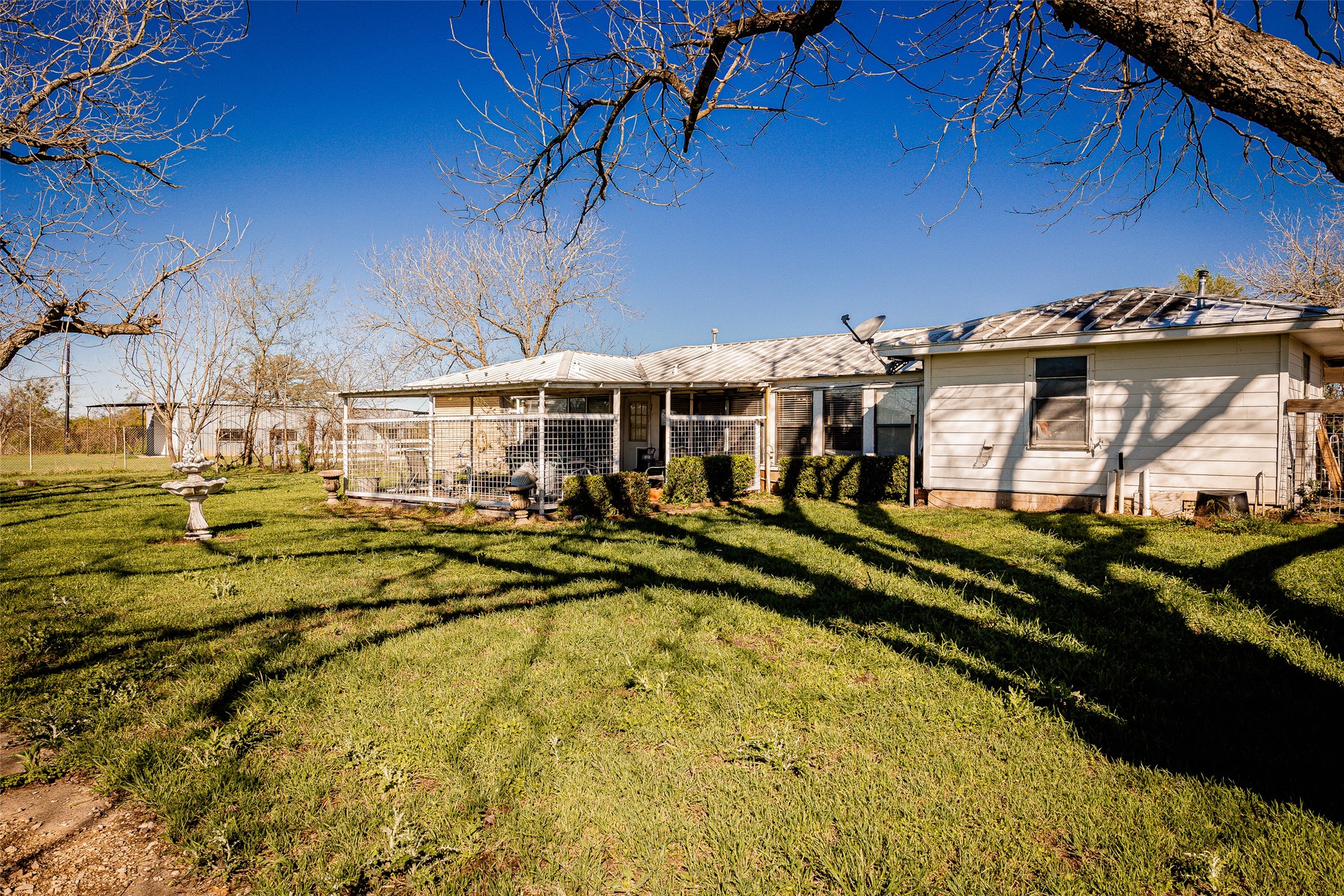 8608 Captain Scott Road Brenham, TX 77833 - Photo 19 of 28 a view of a swimming pool with outdoor seating
