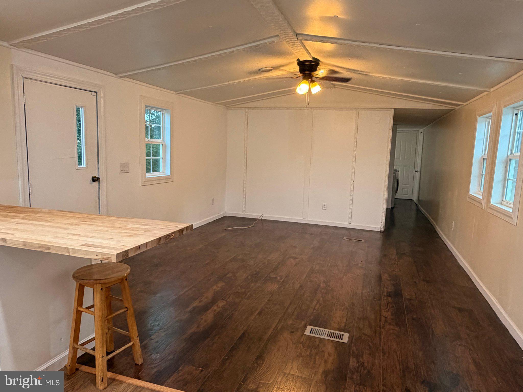 24 Carpenter Street, Unit 24 Dover, DE 19901 - Photo 17 of 27 Spacious, light-filled living area.
