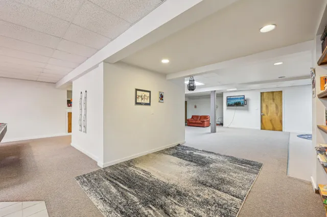 a kitchen with sink and cabinets