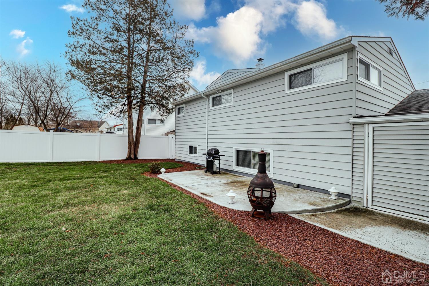 62 Albemarle Road Colonia, NJ 07067 - Photo 22 of 25 a view of back yard of the house