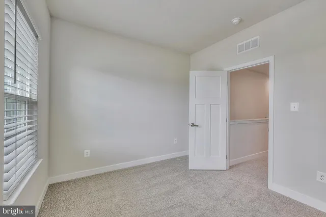 a bathroom with a sink toilet and vanity