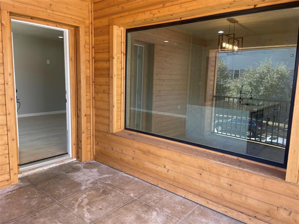 4609 Virginia Avenue, Unit 202 Dallas, TX 75204 - Photo 14 of 21 a view of backyard and window