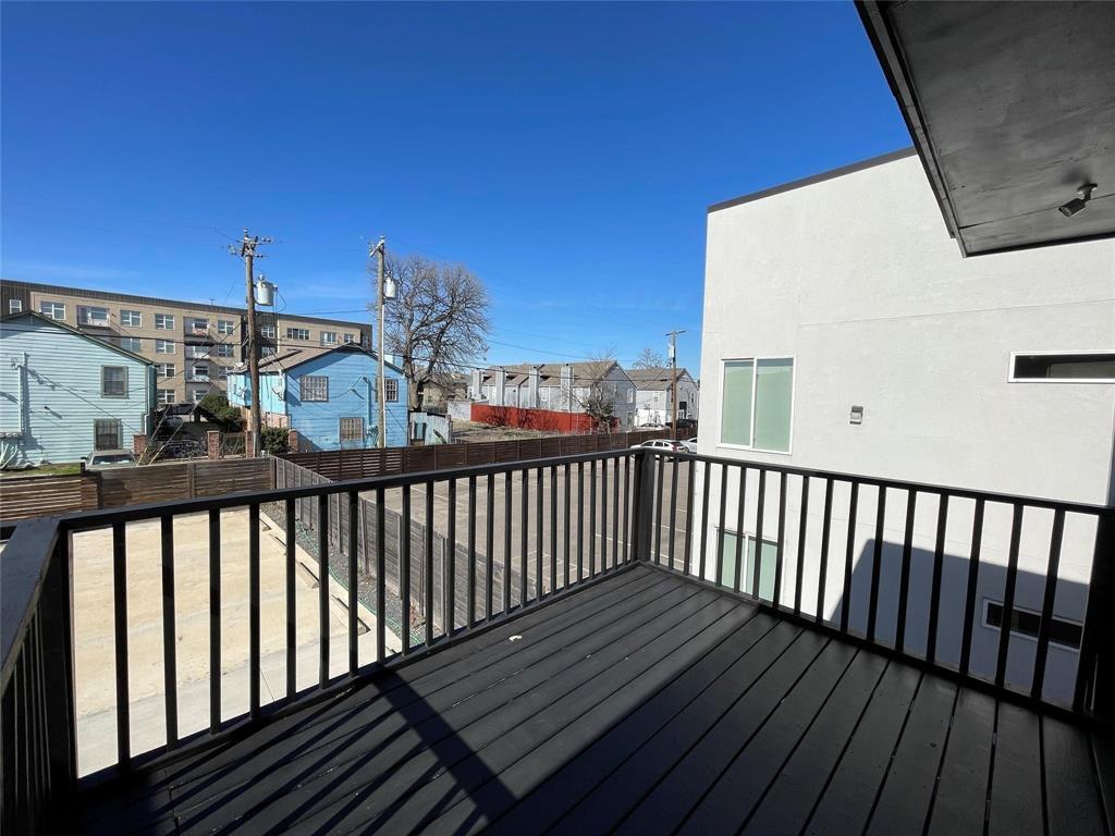 4609 Virginia Avenue, Unit 202 Dallas, TX 75204 - Photo 18 of 21 a view of a balcony with wooden floor